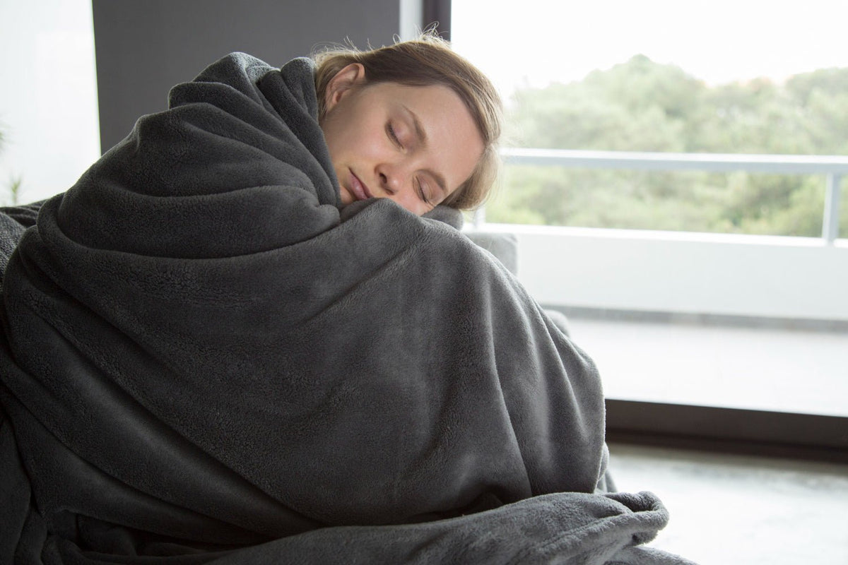 What Makes the Black Sheep Blanket a Wintertime Staple - OLIVIA'S