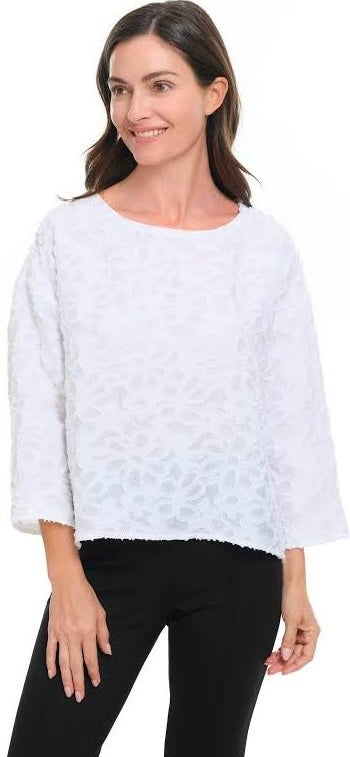 White semi-sheer floral topper, front three-quarter view, styled with black leggings