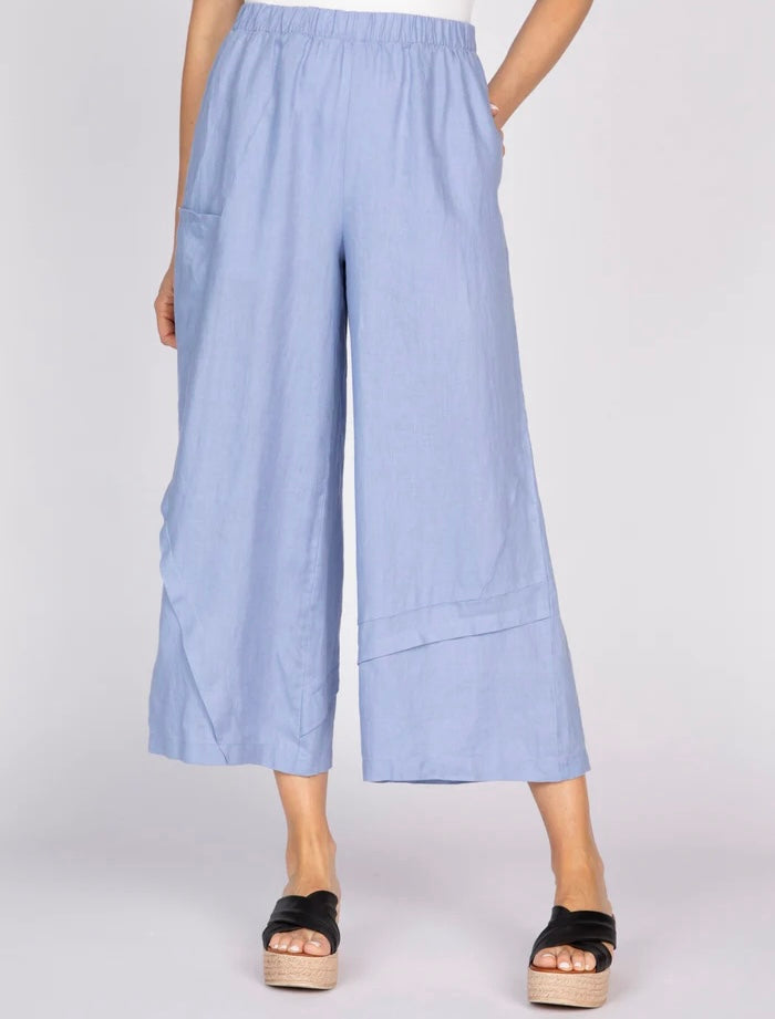 "Olivia by Habitat Women's Crossroads Seamed Pant in lavender blue linen, front view, wide-leg cropped silhouette with elastic waist and angled pleat detail"