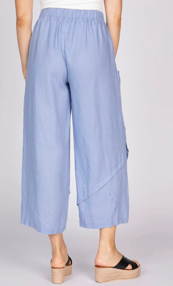 "Olivia by Habitat Women's Crossroads Seamed Pant in lavender blue linen, back view showing elastic waist and angled seam detail"
