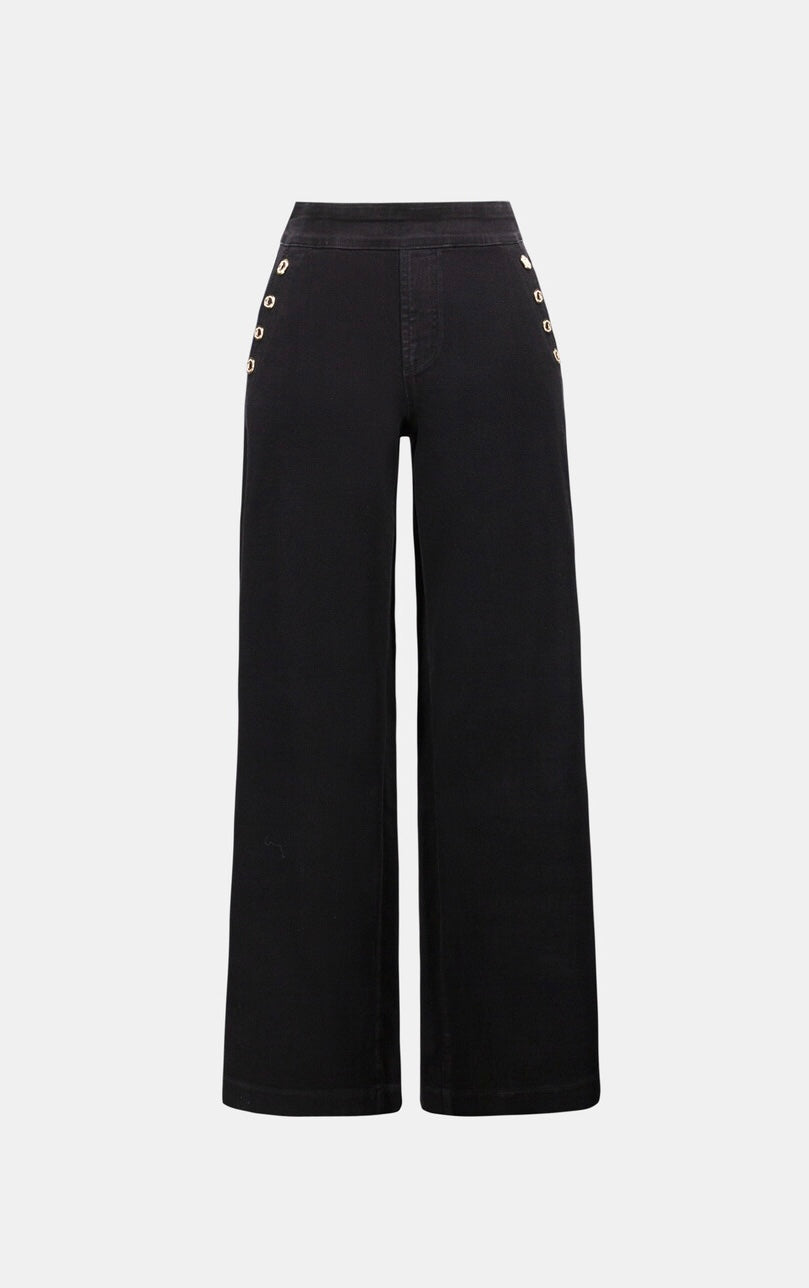 Black wide-leg cropped pants with decorative gold-tone button detailing on the outer sides of the hips, shown against a light gray background.