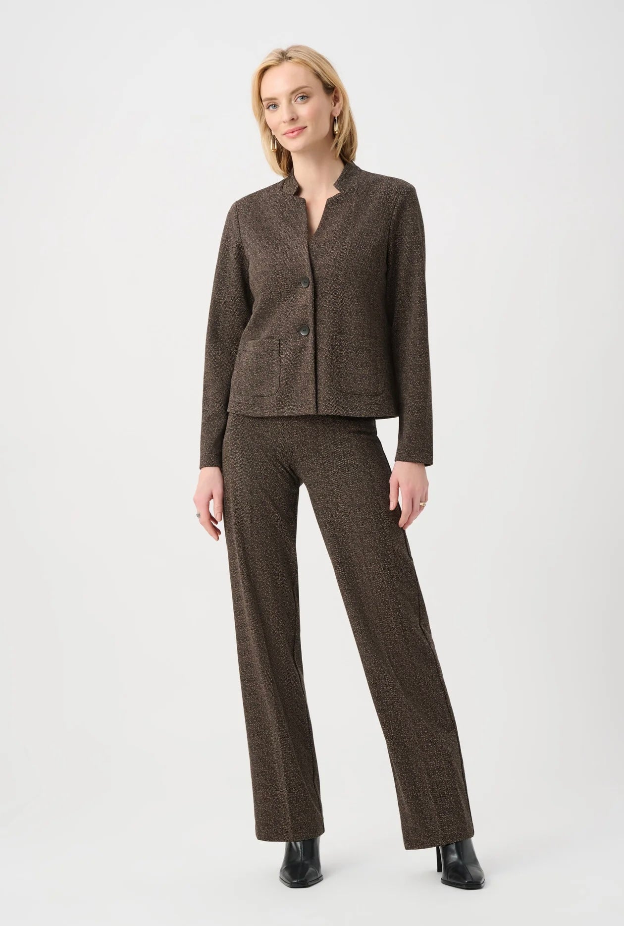 Woman wearing a brown suit on a white background