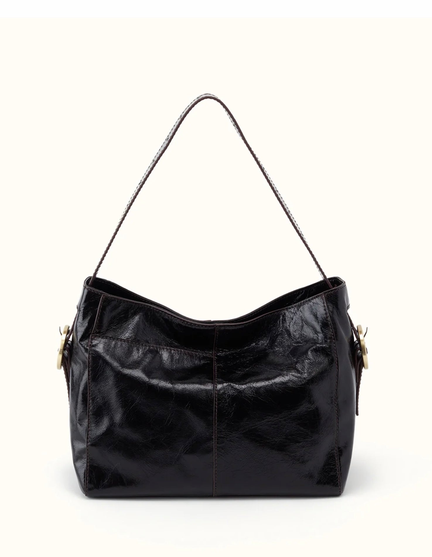 A black leather hobo shoulder bag with a glossy finish, featuring gold-tone hardware and a thin black chain strap, set against a plain off-white background.