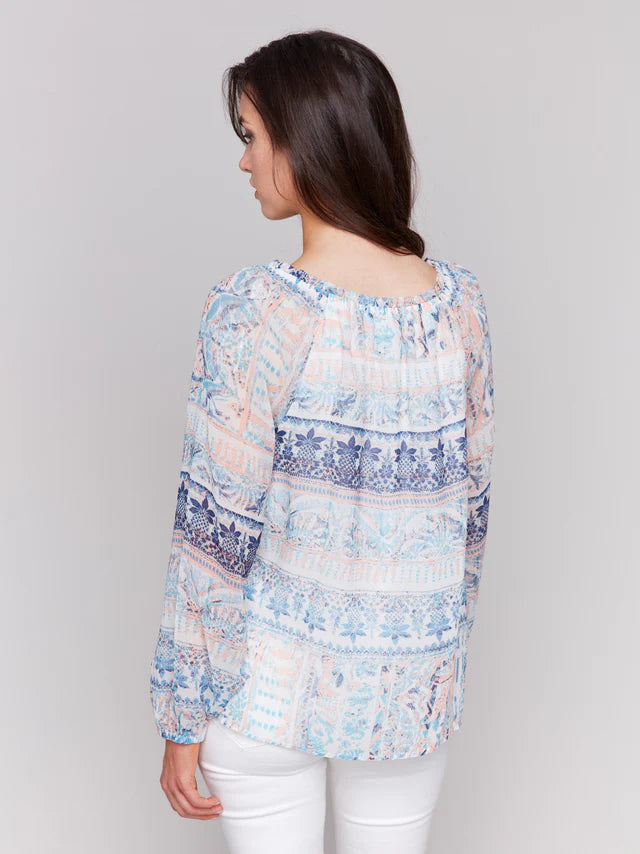 women in long sleeve blouse