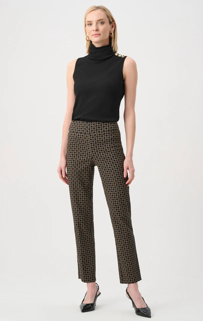 Joseph Ribkoff Geometric Jacquard Straight Pull-On Pant in black and gold, full-length front view styled with black sleeveless turtleneck and black slingback heels