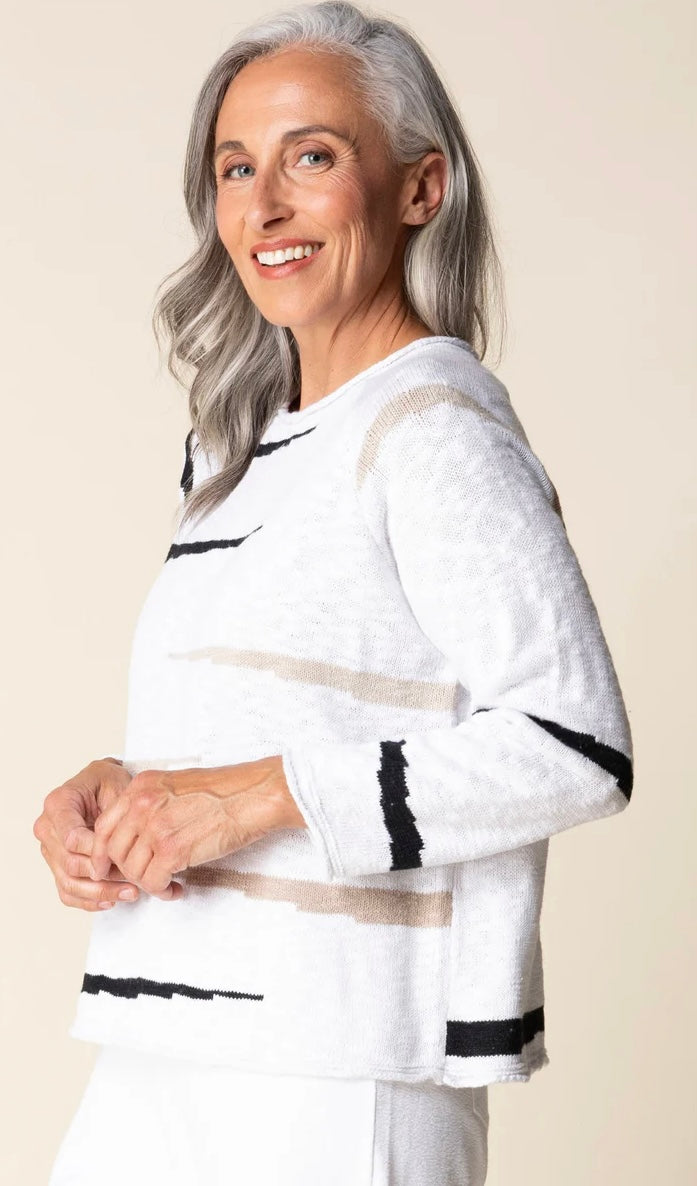 Habitat Boardwalk Pullover in white with grey and blush stripe, full-length front view styled with white wide-leg culottes and white slide sandals
