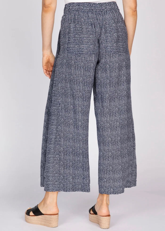 Olivia by Habitat Gemma Flood linen pant in navy geometric print, back view showing elastic waistband and wide leg