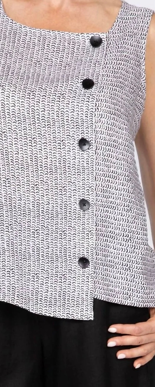 Button detail — Detail view of off-center button closure on women's flax stripe sleeveless top