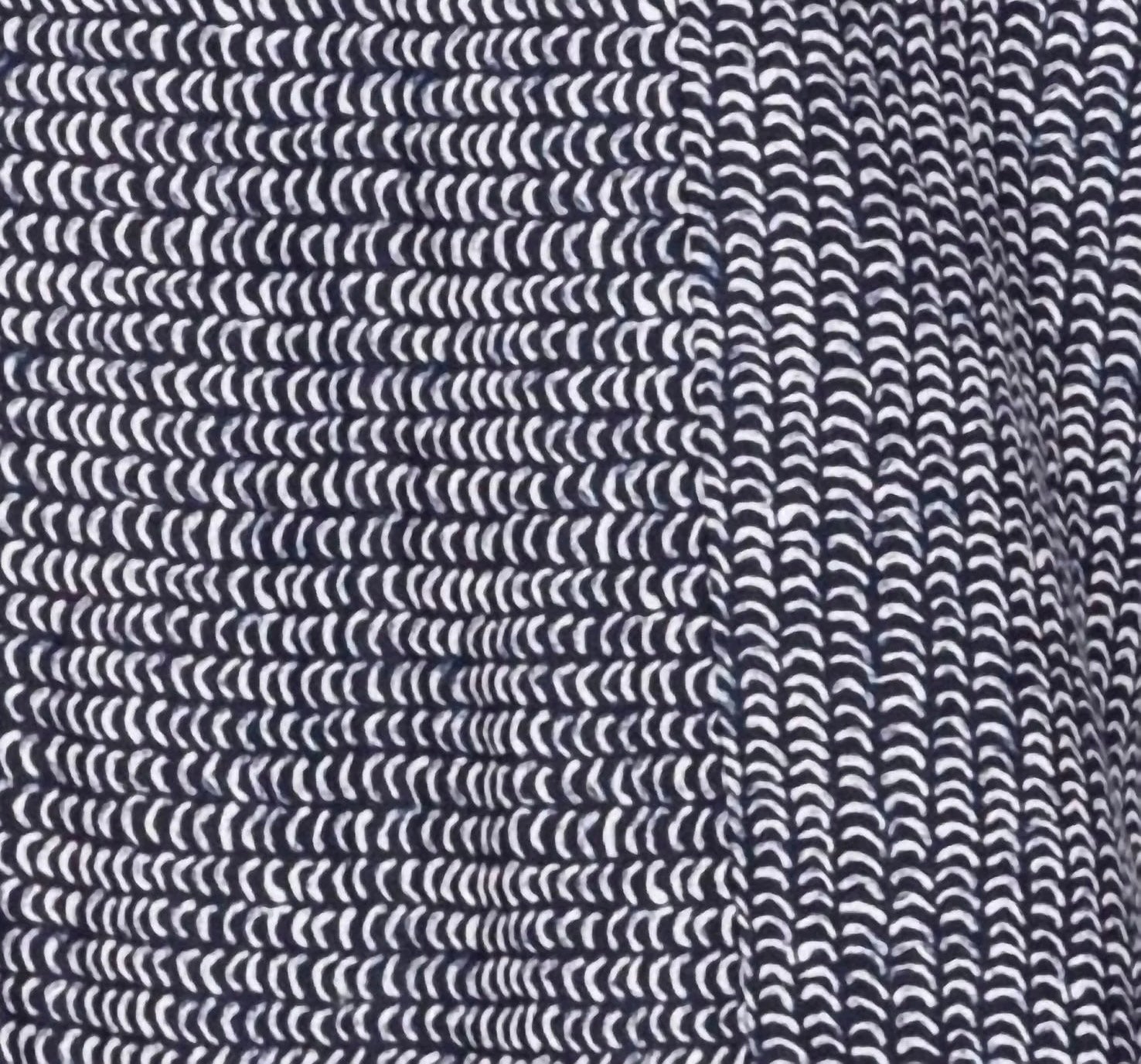 Fabric closeup — Close-up of black and white scallop stripe flax fabric texture