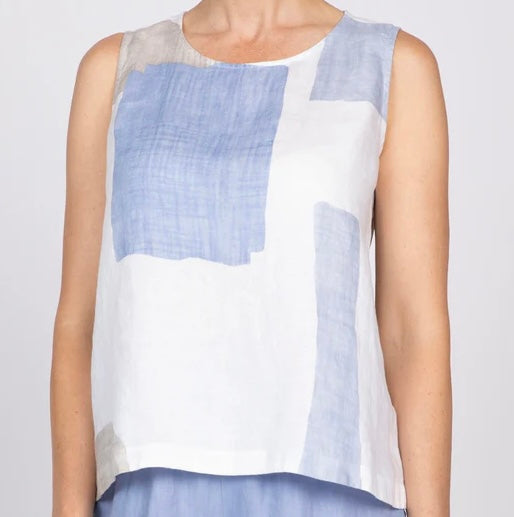 "Detail crop of Olivia Coastal Colorblock Sunset Tank showing blue and white hand-painted linen print and relaxed swing silhouette"