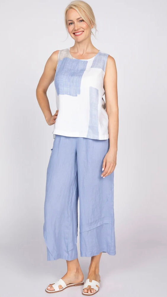 "Olivia Coastal Colorblock Sunset Tank full-length front view, paired with blue linen wide-leg pants and white slide sandals"