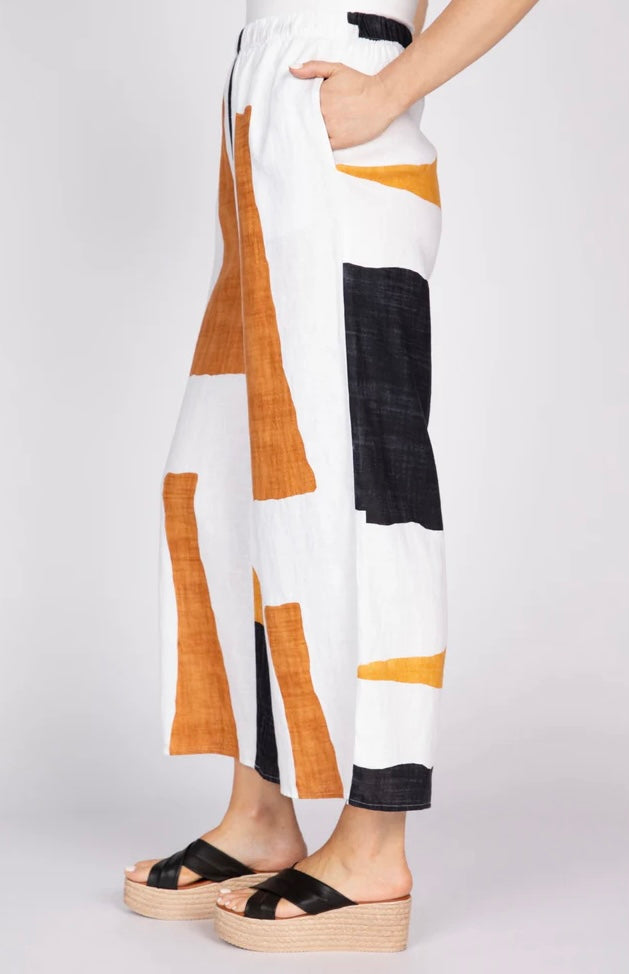  "Olivia Women's Coastal Colorblock Breeze Pant side view showing wide-leg silhouette and hand-painted amber and black colorblock linen print"