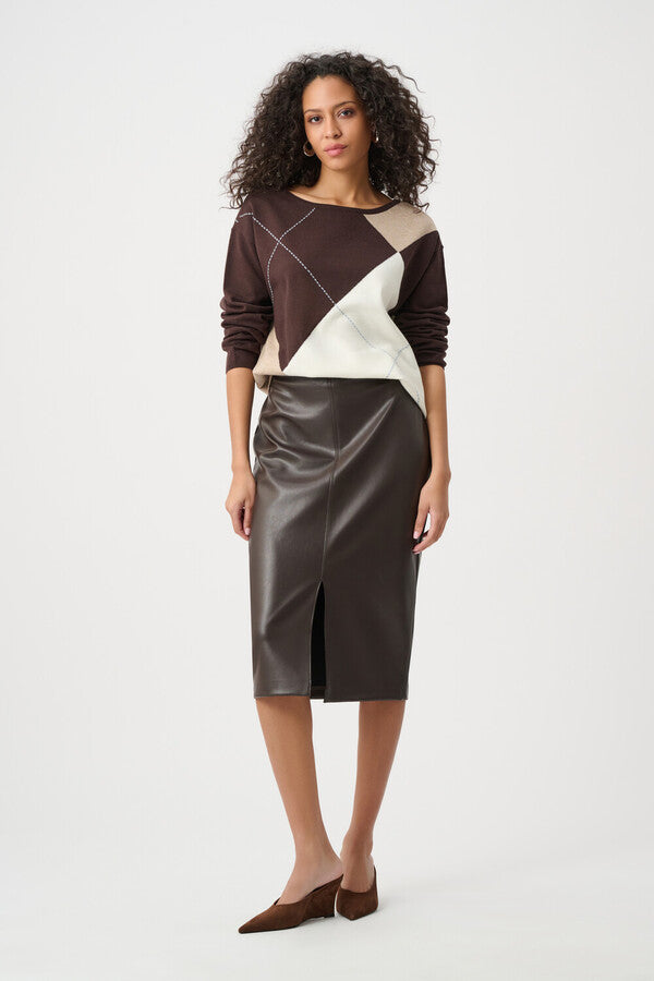  "Joseph Ribkoff Women's Classic Crewneck Sweater in chocolate brown, taupe, and cream argyle colorblock, full-length front view on curly-haired model styled with brown faux leather pencil skirt and brown mules, white background"
