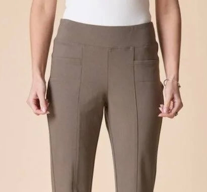 A model wearing high-waisted, straight-leg trousers in a muted taupe-brown color, paired with a white top against a solid beige background.
