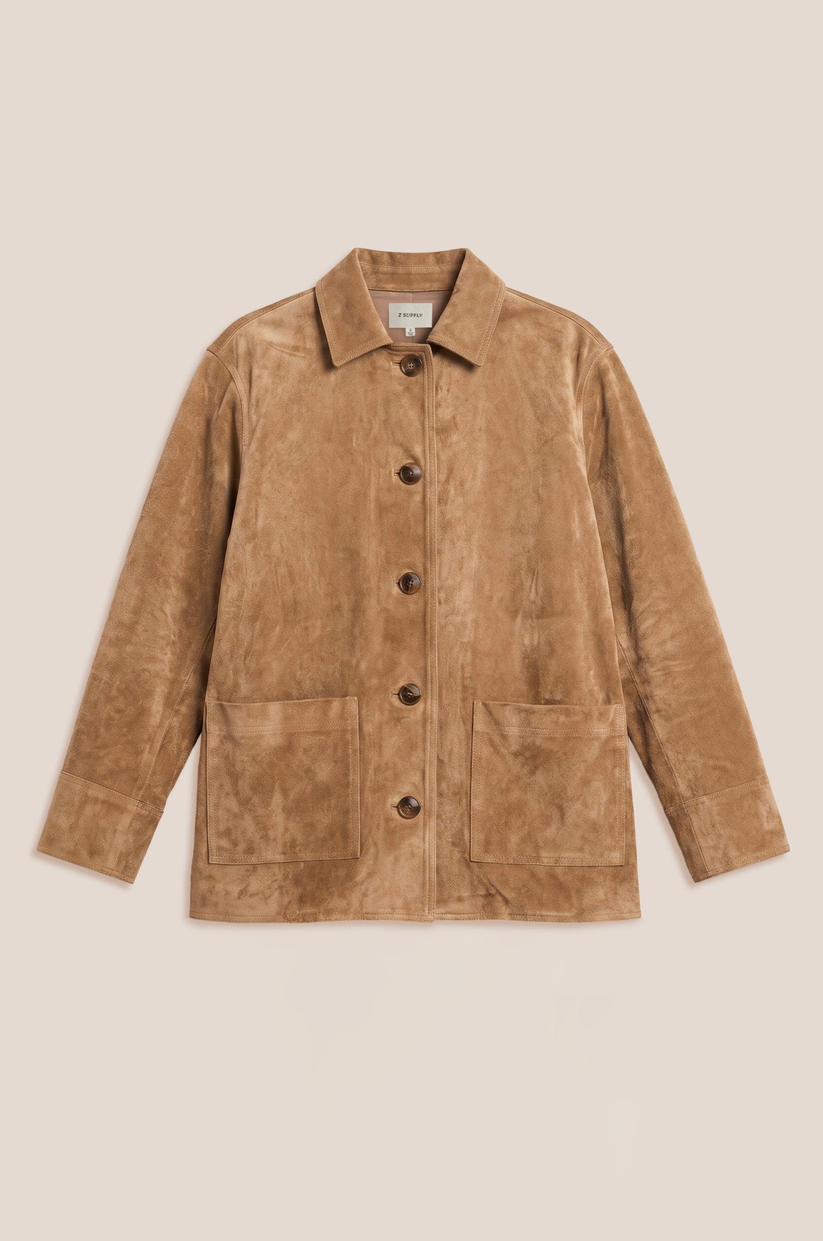 A tan suede jacket with a button-up front, collar, and two front patch pockets, displayed flat against a light beige background. -OLIVIA'S