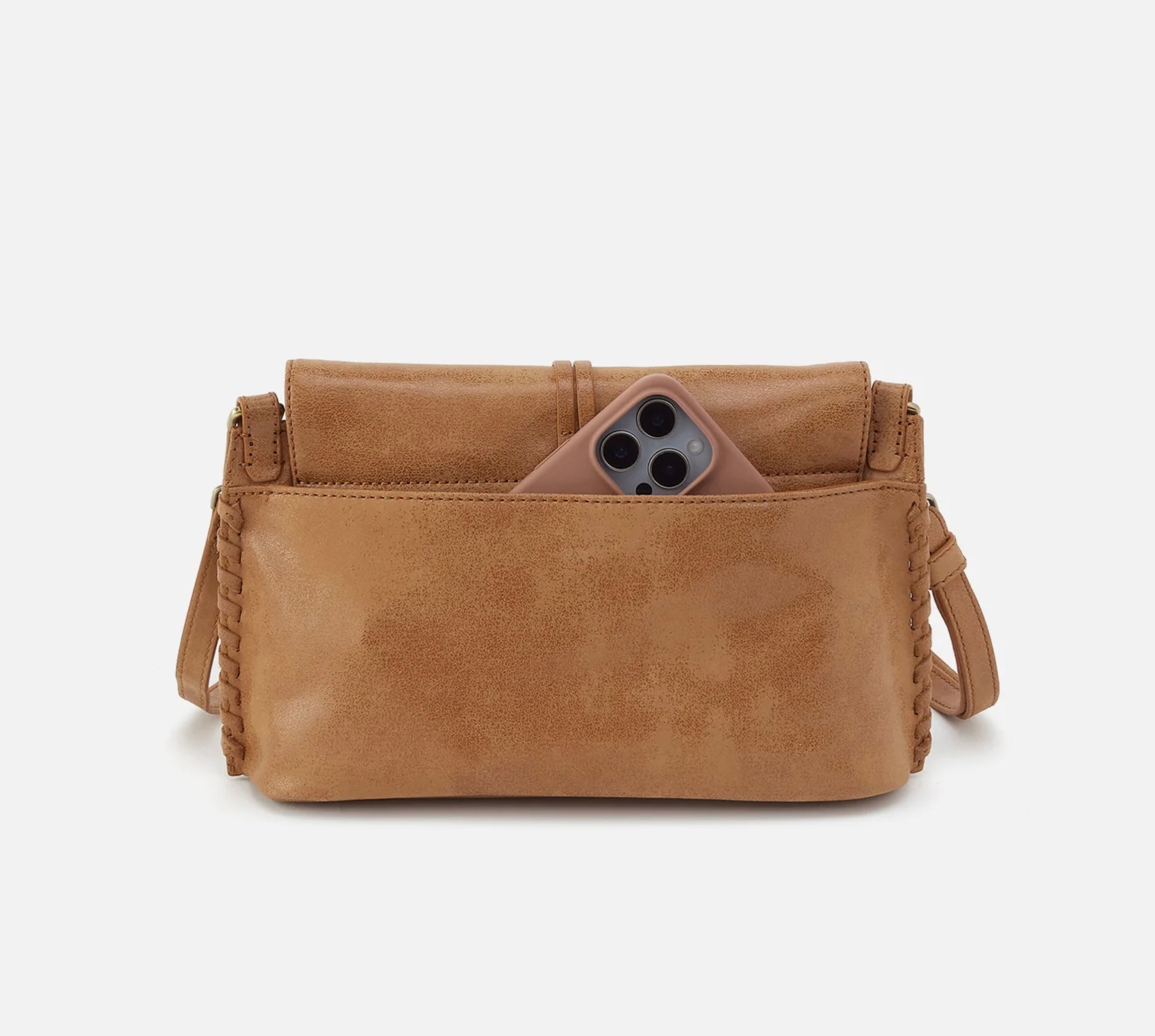 Brown leather handbag with a phone case pocket on a white background
