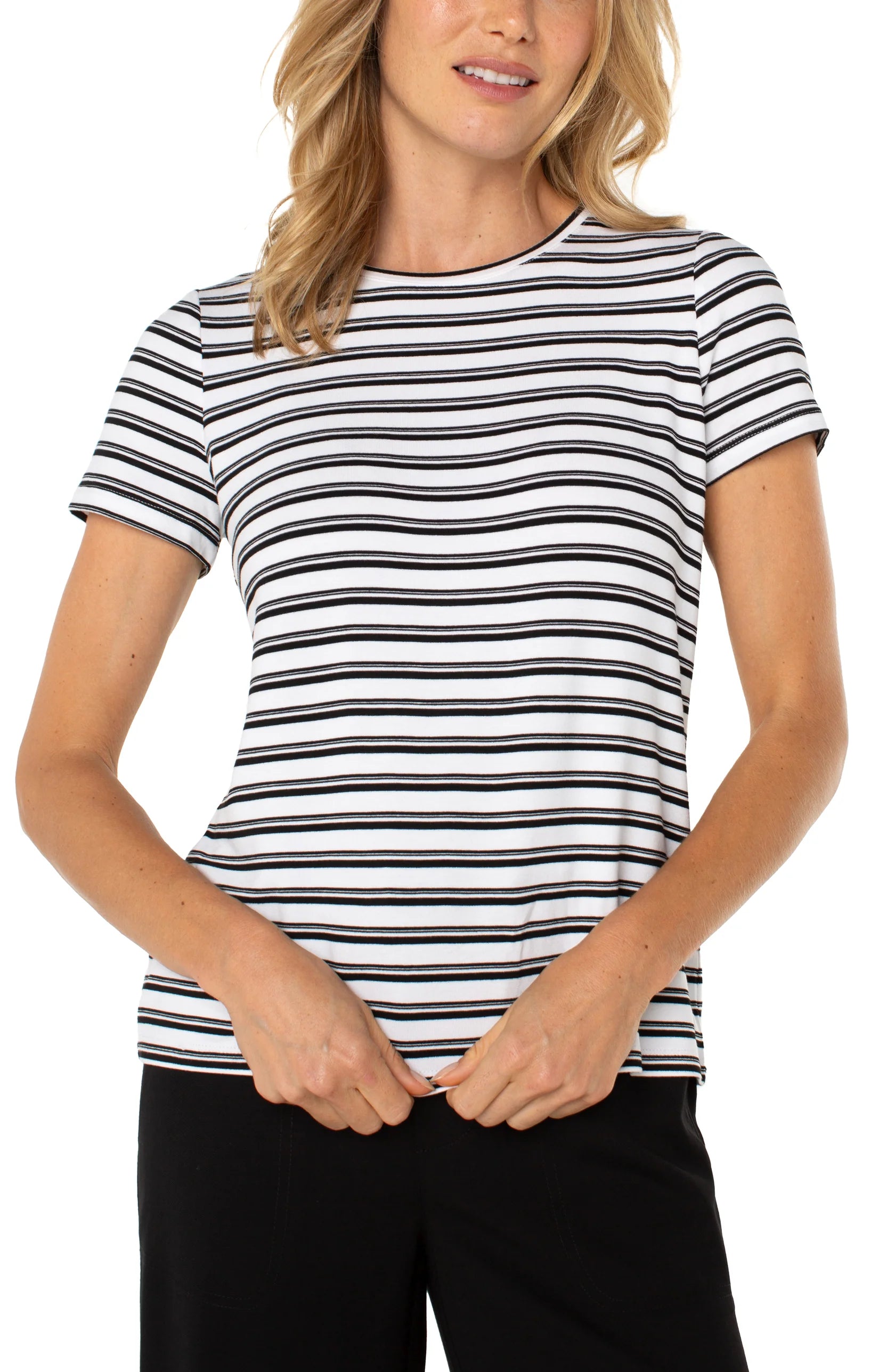 Woman wearing a black and white striped t-shirt